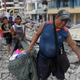 Residents recover their belongings in Pedernales, Ecuador, several days after a magnitude 7.8 earthquake, the largest in decades, rocked the coastline last year. Photo: AP